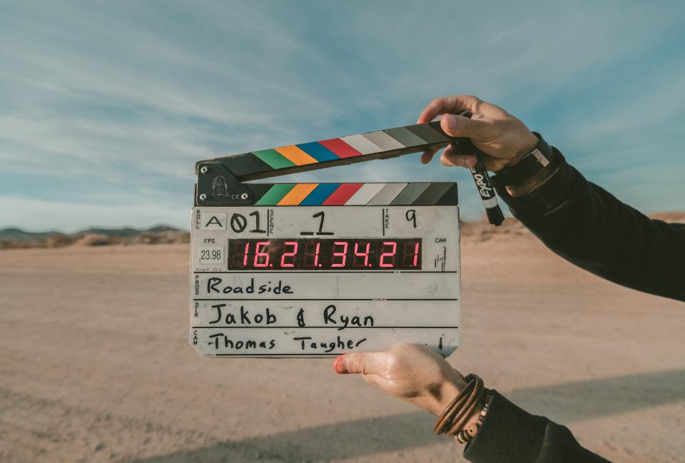 Film crew clapperboard for the hire a studio vs DIY article